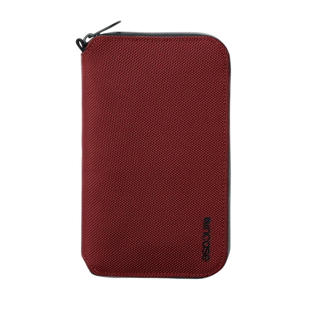 Стилен и практичен портфейл с множество отделения - Incase Travel Passport Zip Wallet (червен)